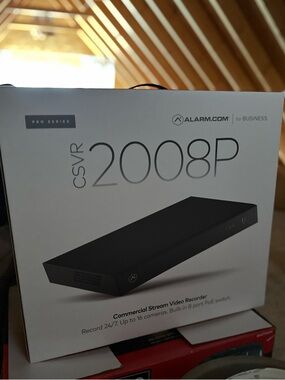 CSVR 2008P Commercial Stream Video Recorder with a box of cameras and a monitor